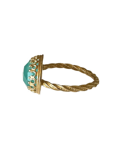 This beautiful 18K recycled gold ring is simple, elegant, and timeless. The 14x10mm oval rose cut aqua chalcedony is set in a delicate filigree bezel. The shank is a beautiful round swirling pattern, that evokes ancient jewels. This ring was inspired by Ancient Greek and Roman jewelry, which is one of my favorite jewelry. I named the ring Amare which means Love in Latin, &nbsp;love is what is behind all my work!&nbsp;
