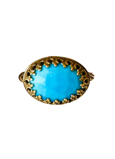 This beautiful 18K recycled gold ring is simple, elegant, and timeless. The 14x10mm oval rose cut turquoise is set in a delicate filigree bezel. The shank is a beautiful round swirling pattern, that evokes ancient jewels. This ring was inspired by Ancient Greek and Roman jewelry, which is one of my favorite jewelry. I named the ring Amare which means Love in Latin, &nbsp;love is what is behind all my work!&nbsp;
