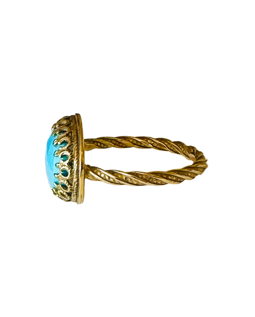 This beautiful 18K recycled gold ring is simple, elegant, and timeless. The 14x10mm oval rose cut turquoise is set in a delicate filigree bezel. The shank is a beautiful round swirling pattern, that evokes ancient jewels. This ring was inspired by Ancient Greek and Roman jewelry, which is one of my favorite jewelry. I named the ring Amare which means Love in Latin, &nbsp;love is what is behind all my work!&nbsp;
