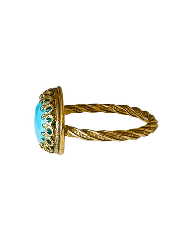 This beautiful 18K recycled gold ring is simple, elegant, and timeless. The 14x10mm oval rose cut turquoise is set in a delicate filigree bezel. The shank is a beautiful round swirling pattern, that evokes ancient jewels. This ring was inspired by Ancient Greek and Roman jewelry, which is one of my favorite jewelry. I named the ring Amare which means Love in Latin, &nbsp;love is what is behind all my work!&nbsp;
