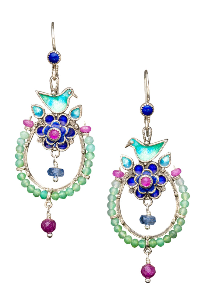 Enameled bird nesting on flower with set 3mm rose cut ruby. A beautiful faceted kyanite dangles from the flower. There is an arch of chrysoprase below, with a faceted ruby drop, and a 3mm lapis lazuli accent on the ear wire. These earrings are gorgeous, light weight, colorful, and unique!