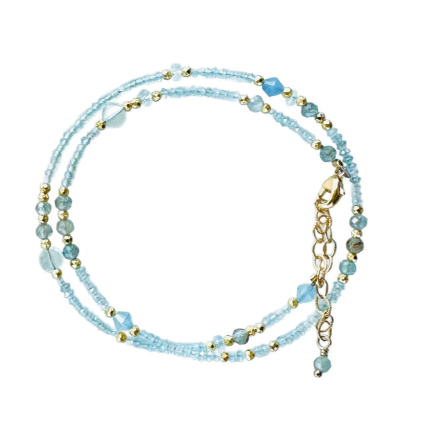 Aquamarine &amp; pyrite beaded wrap double strand bracelet with gold fill lobster clasp, and gold-filled extender chain. It wraps around the wrist twice. 12.5" to 14.75" long with aquamarine adornment at the end of extender.