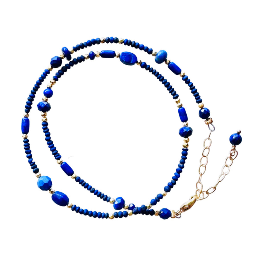 Lapis Lazuli &amp; pyrite beaded wrap double strand bracelet with gold fill lobster clasp, and gold-filled extender chain. It wraps around the wrist twice. 12.5" to 14.75" long with lapis lazuli adornment at the end of extender.