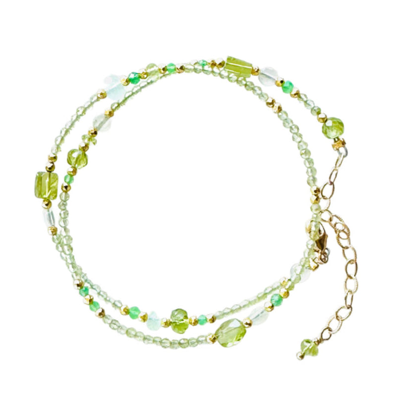 Peridot, pyrite, chrysoprase &amp; aqua quartz beaded wrap double strand bracelet with gold fill lobster clasp, and gold-filled extender chain. It wraps around the wrist twice. 12.5" to 14.75" long with peridot adornment at the end of extender.