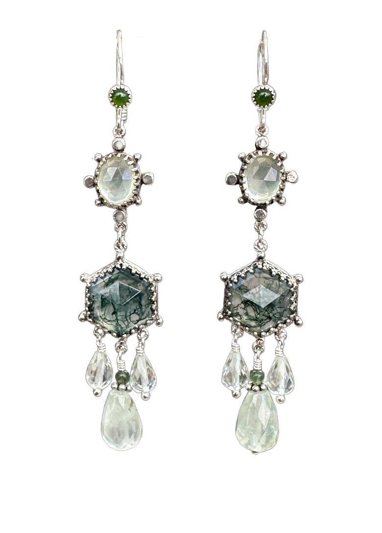 These elegant earrings are a versatile medium &nbsp;size chandelier. They feature a rose cut hexagon moss agate framed in a delicate lacy bezel with an open back to let the light shine through.

From the hexagon hangs a faceted prehnite drop with a small jade on top and two small faceted green amethyst drops on either side.&nbsp;

Above the hexagon is an oval rose cut prehnite set in a bezel with silver dot adornments. The ear wires have a jade accent.