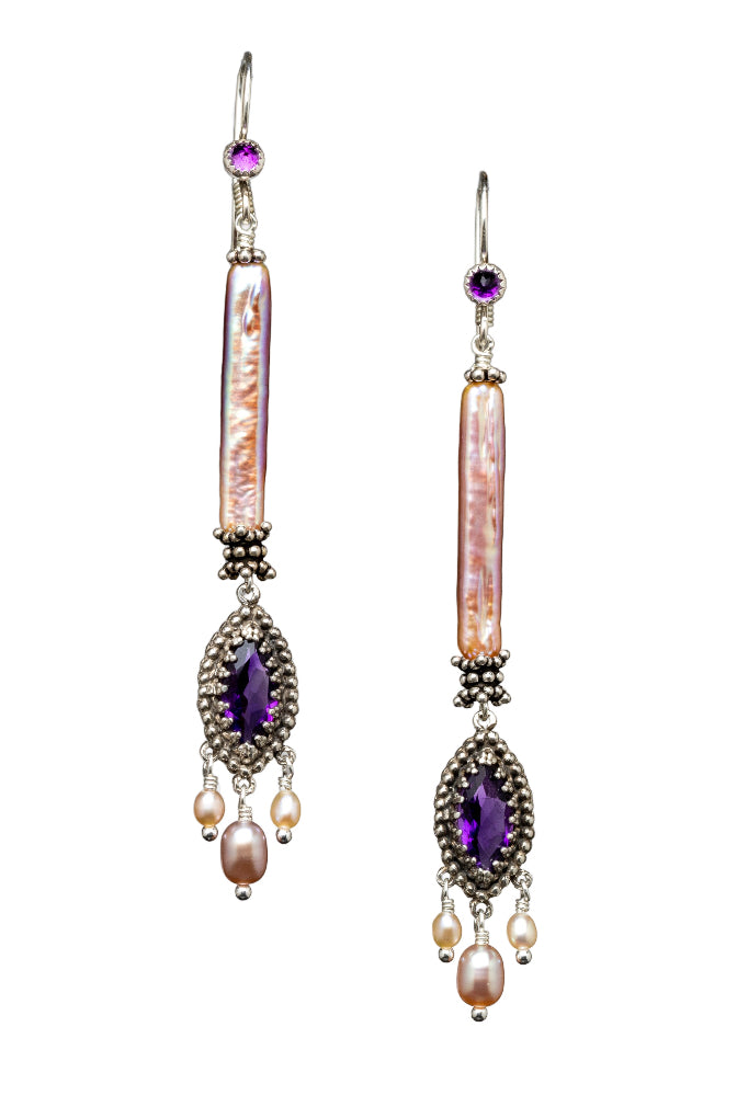 Amethyst &amp; Pearl Earrings

Beautiful amethyst set in a lacy bezel surrounded by tiny silver dots, and with three pearl dangles. This piece hangs from a long beautiful natural color pearl &nbsp;with great luster. These earrings are elegant, lightweight and versatile.&nbsp;