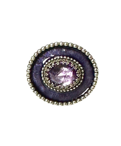  A horizontal 1"x7/8" oval with purple enamel and an 11x9mm Amethyst set in the center, in a lacy bezel. The band has a delicate floral pattern, is 1/8" and sturdy. This ring is a size 6.5