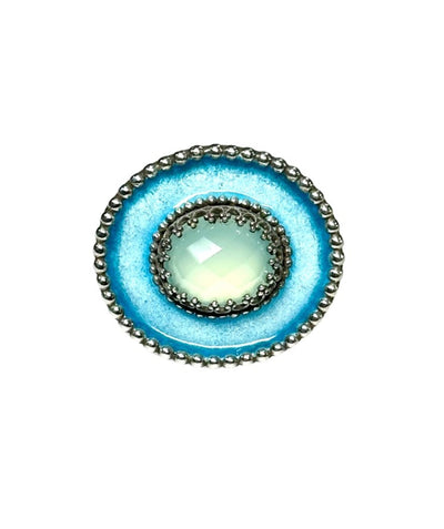 A horizontal 1"x7/8" oval with a light blue with a turquoise border enamel,  has a 11x9mm beautifully cut lemon citrine set in the center, in a lacy bezel. The band has a delicate floral pattern, is 1/8" and sturdy.    This ring is a size 7.5  Materials: Sterling silver, enamel & aqua chalcedony  This ring is unique, fun, beautiful and colorful! 
