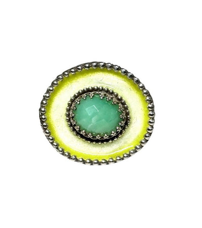 A horizontal 1"x7/8" oval with a light chartreuse with a darker chartreuse border enamel,  has a 11x9mm beautiful rose cut chrysoprase set in the center, in a lacy bezel. The band has a delicate floral pattern, is 1/8" and sturdy.    This ring is a size 8.5  Materials: Sterling silver, enamel & chrysoprase   This ring is unique, fun, beautiful and colorful! 