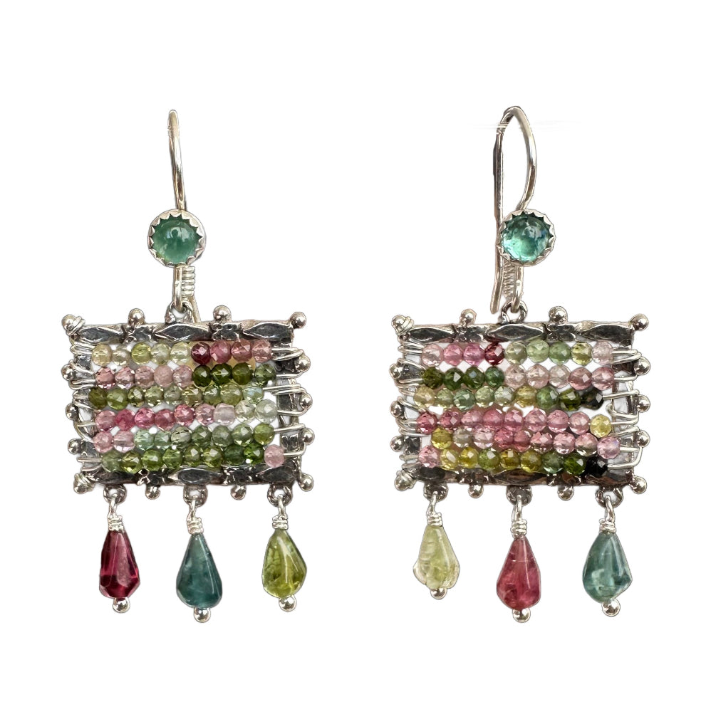 Small Tourmaline Mosaic Earrings - Multi color

Patterned rectangular frame is filled with tiny micro-faceted multi-colored tourmalines. From the bottom of the rectangle hang three tourmaline drops. The ear wires have a 4mm tourmaline accent. These earrings were inspired by micro mosaics.