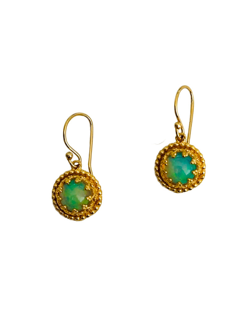 Beautiful 7mm cabochon Ethiopian Opal stone set in a delicate filigree bezel, surrounded by tiny dots. These earrings are 18K gold plated over sterling silver (vermeil). This is a classic design that can be worn daily.