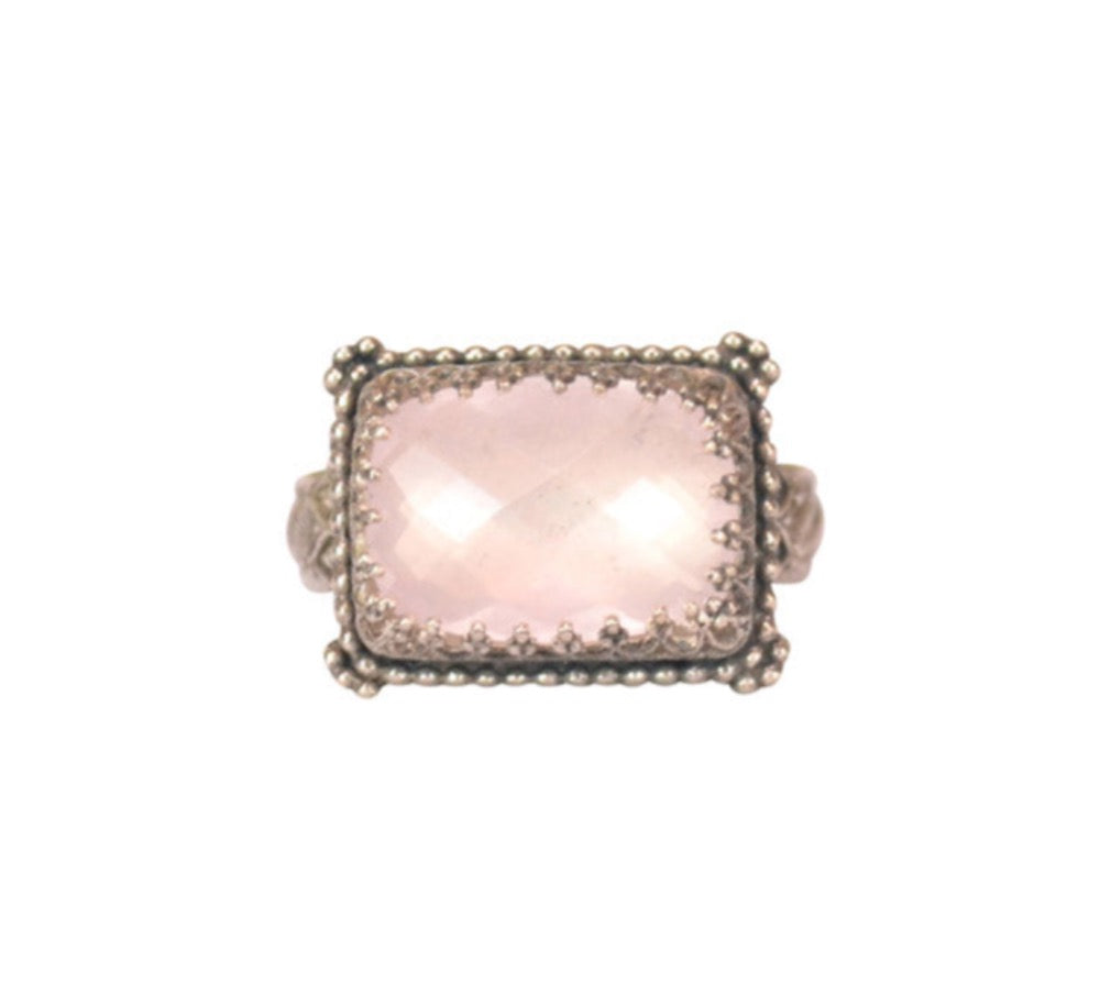 Rose Quartz Rectangular Ring  Checker cut 14x10mm rose quartz stone, set in a filigree bezel. Bezel surrounded by baby silver dots. Ring has a pattern band with special detail next to the setting.  Ring available in size 6, 7, 8, 9 & 10  Materials: Sterling silver & rose quartz