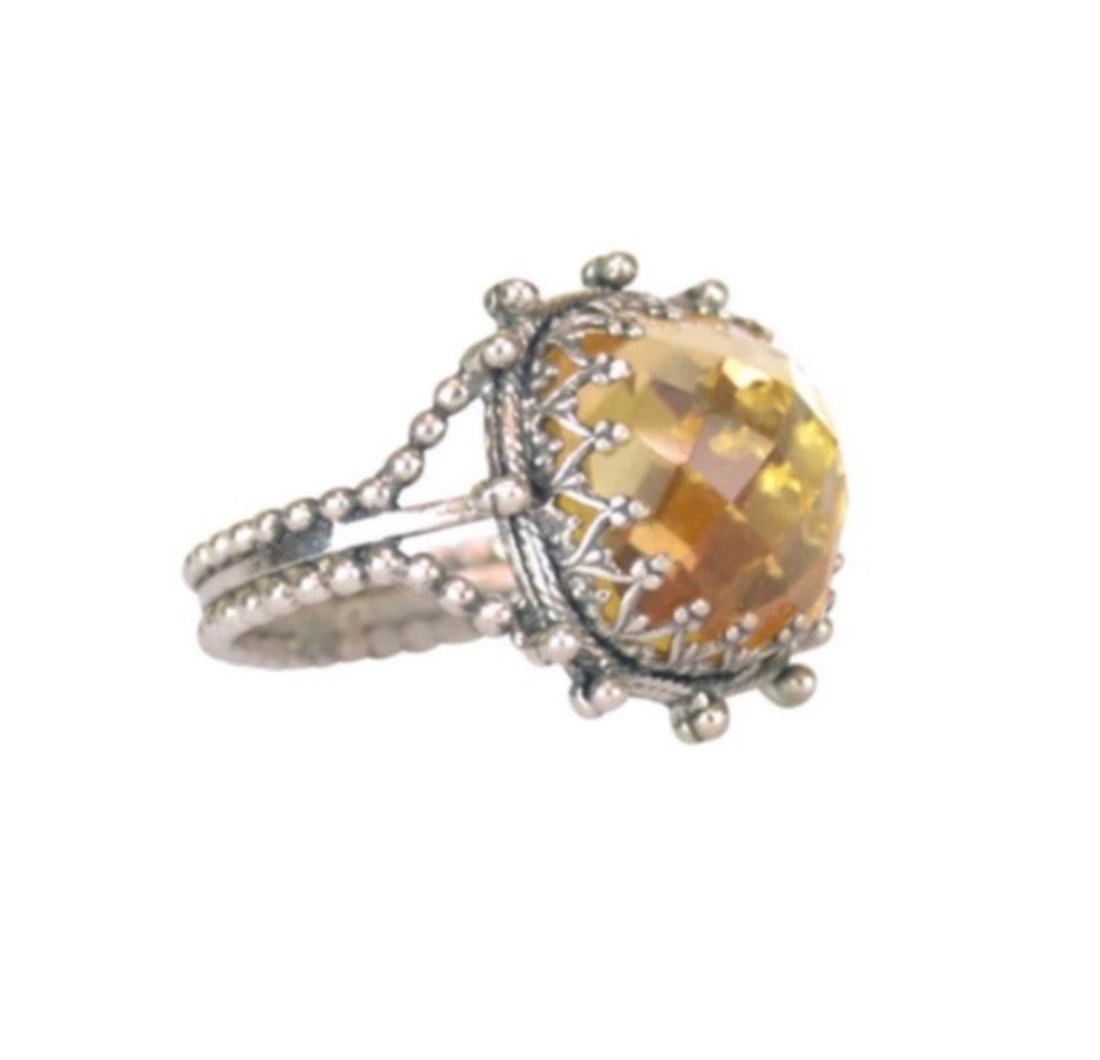 Citrine Crown Ring Delicate, elegant sterling silver ring. A 12mm cushion rose cut citrine stone is set in a lacy bezel, with elegant shank. This is a ring that you will love wearing and will cherish for years to come. The ring comes in sizes 4.5 to 12 in half sizes.